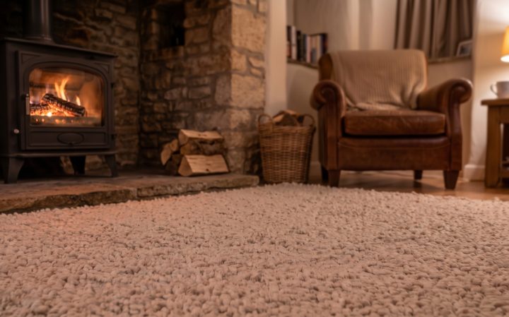 A country cottage sitting room with a wood-burning stove