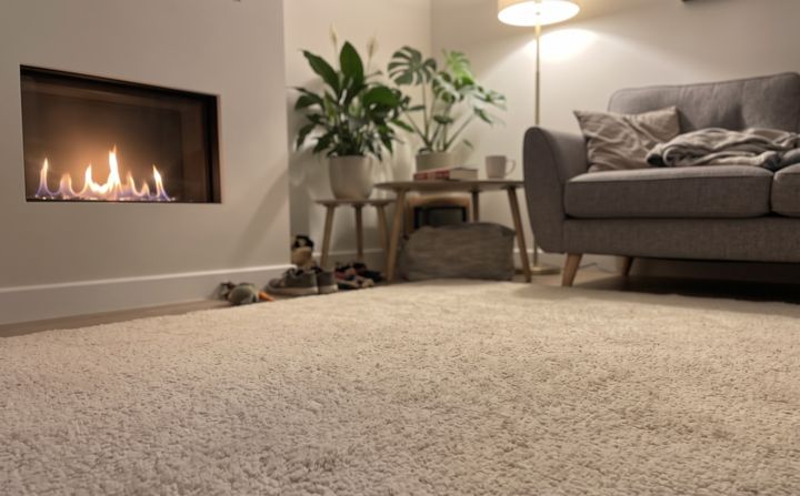 A modern living room with a low gas fire